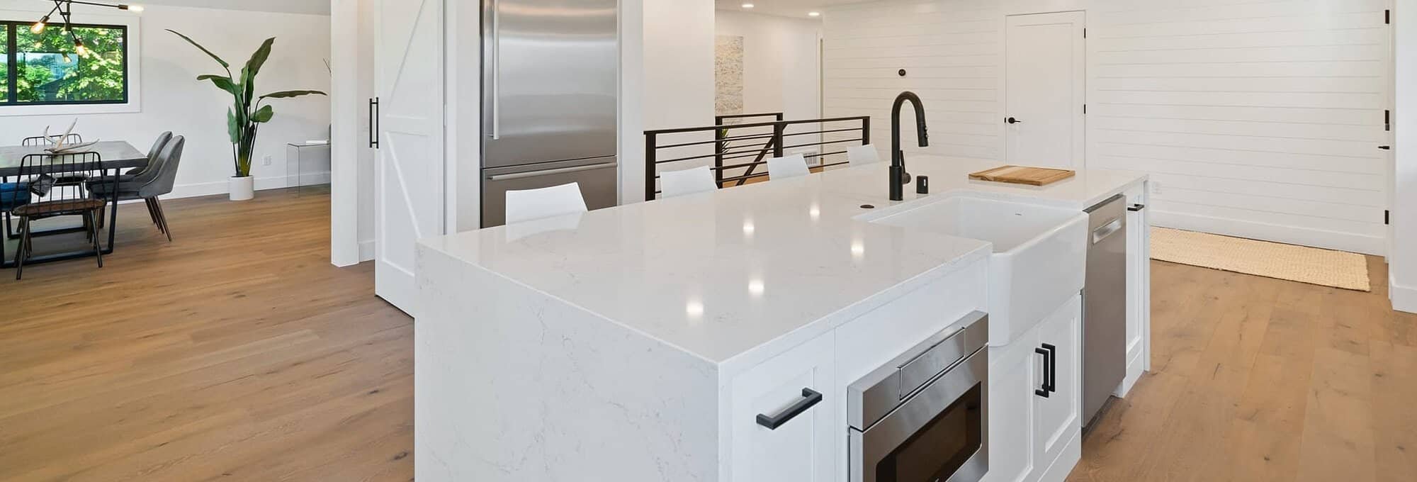 moisture resistant laminate flooring installed in modern kitchen